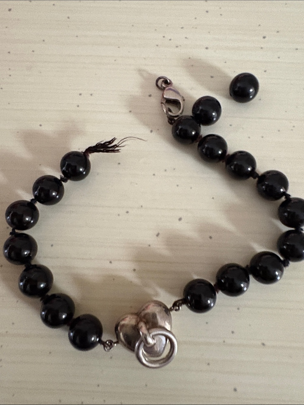 Authentic Tiffany & Co. Black Beaded Bracelet with Heart Clasp